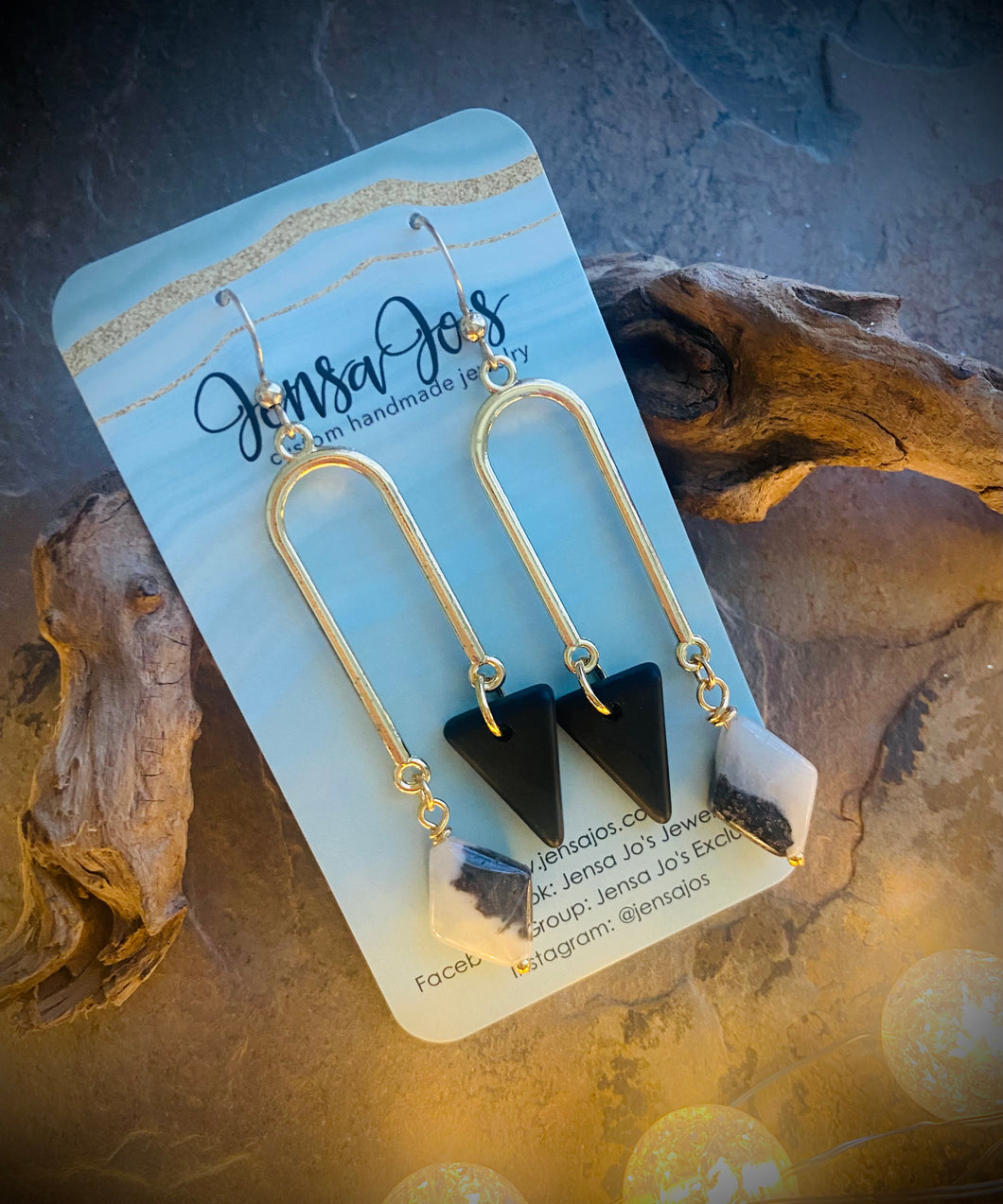 Black spike horseshoe earrings